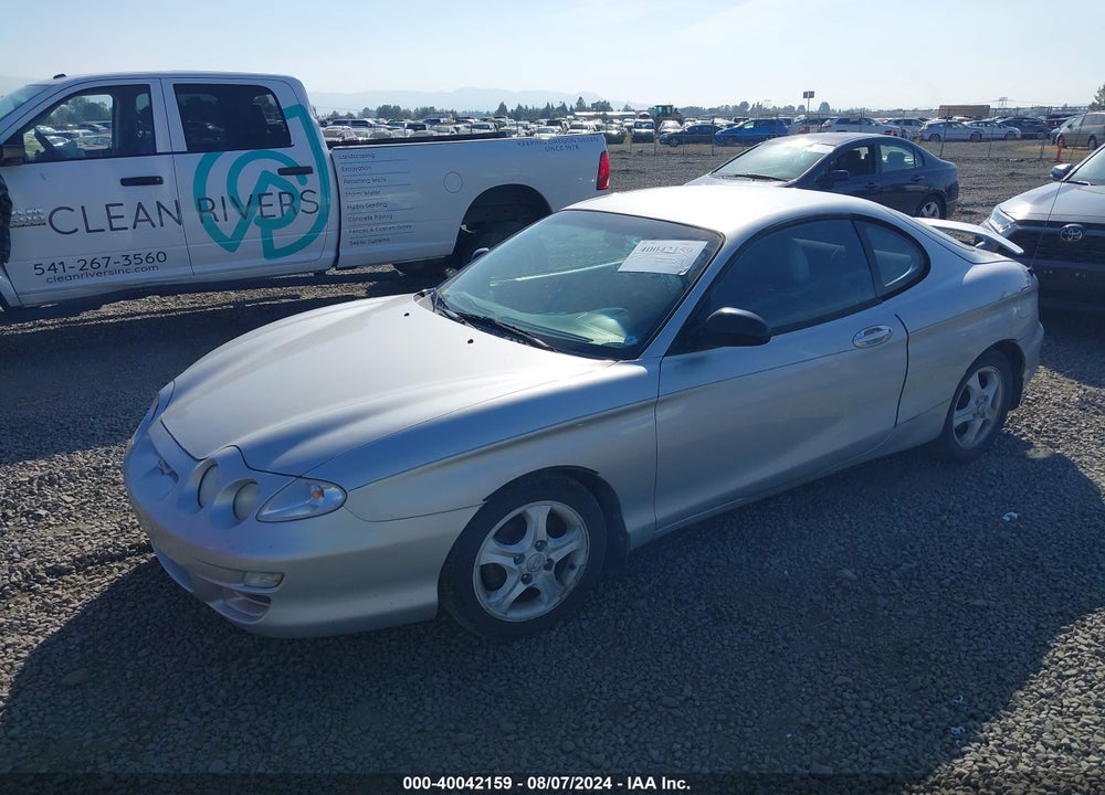 2001 HYUNDAI TIBURON BASE PKG 1   2 VIN: KMHJG25F01U250031