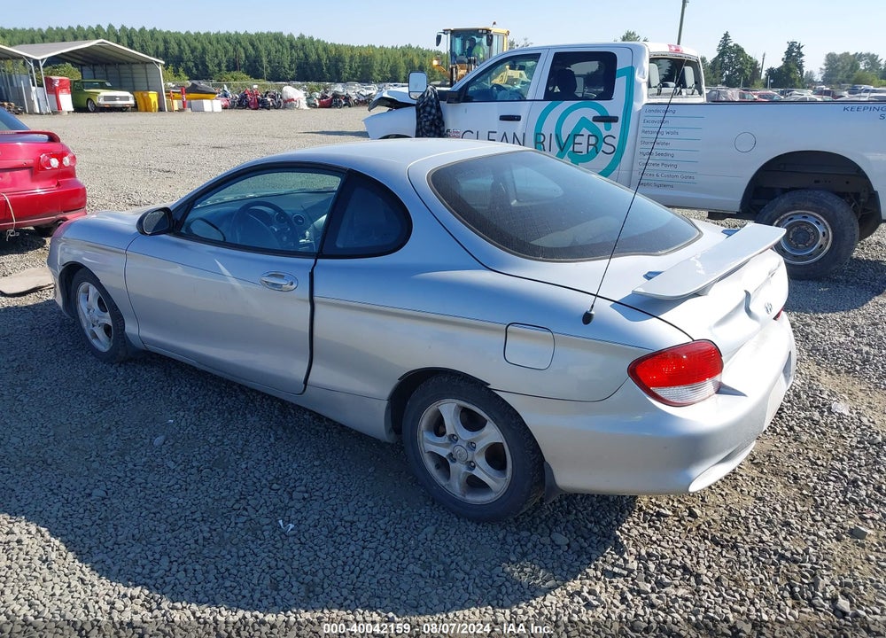 2001 HYUNDAI TIBURON BASE PKG 1   2 VIN: KMHJG25F01U250031
