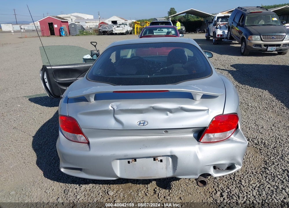 2001 HYUNDAI TIBURON BASE PKG 1   2 VIN: KMHJG25F01U250031