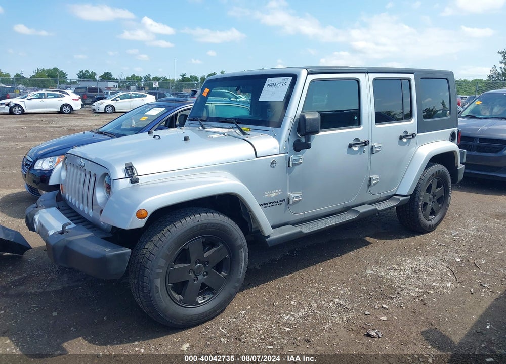 2009 JEEP WRANGLER UNLIMITED SAHARA VIN: 1J4GA59199L765895