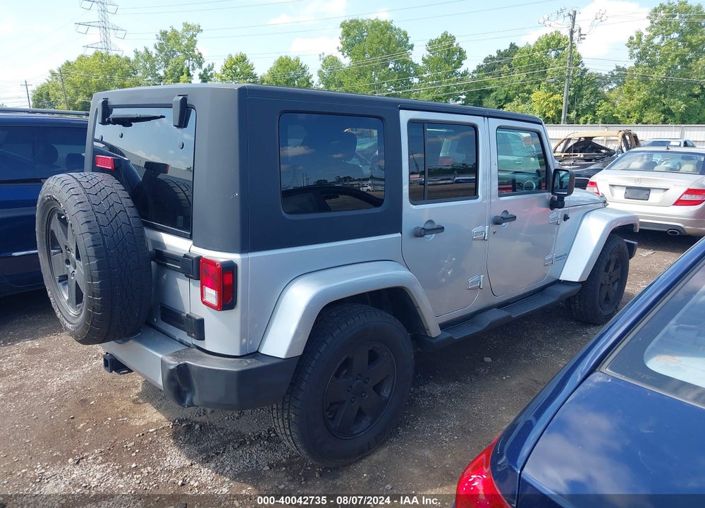 2009 JEEP WRANGLER UNLIMITED SAHARA VIN: 1J4GA59199L765895