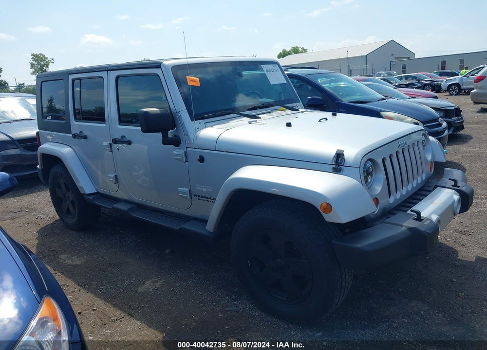 2009 JEEP WRANGLER UNLIMITED SAHARA VIN: 1J4GA59199L765895