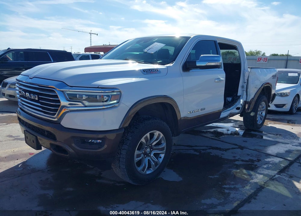 2021 RAM 1500 LIMITED LONGHORN 4X4 5'7 BOX VIN: 1C6SRFKM9MN596615