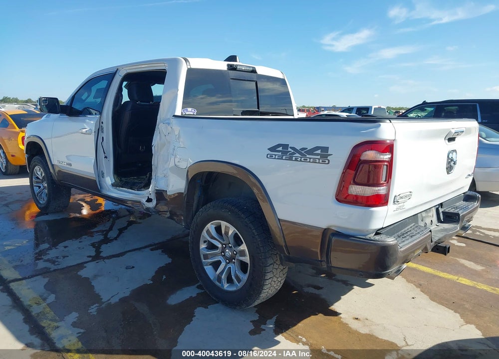 2021 RAM 1500 LIMITED LONGHORN 4X4 5'7 BOX VIN: 1C6SRFKM9MN596615