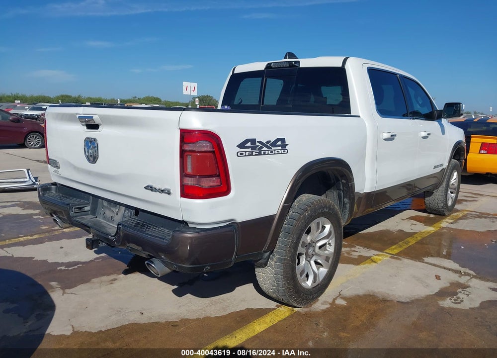 2021 RAM 1500 LIMITED LONGHORN 4X4 5'7 BOX VIN: 1C6SRFKM9MN596615