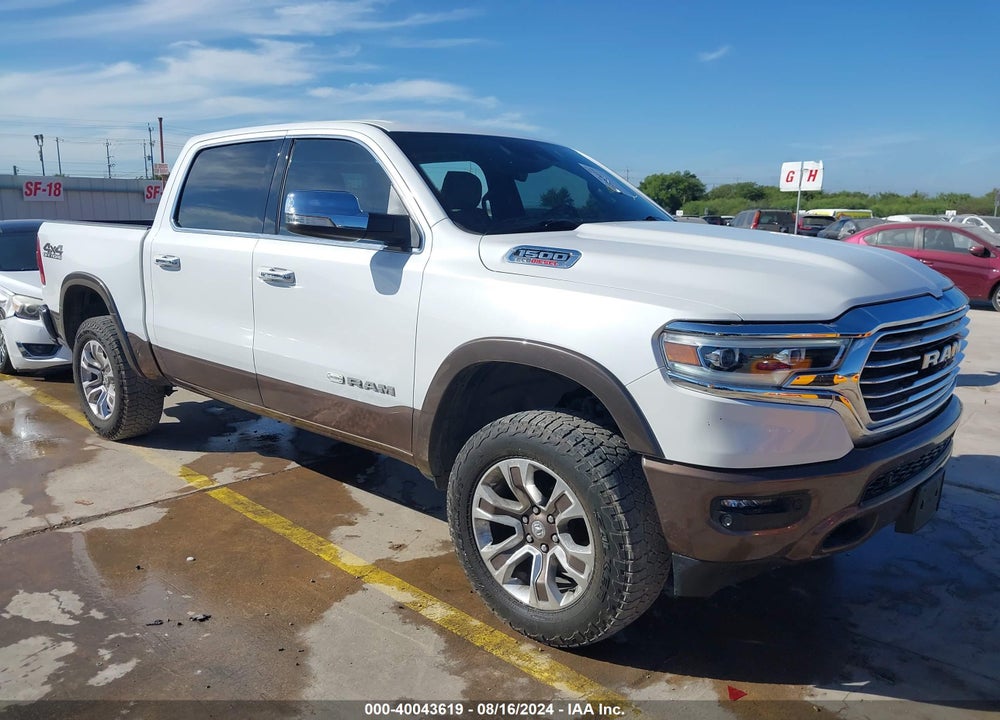 2021 RAM 1500 LIMITED LONGHORN 4X4 5'7 BOX VIN: 1C6SRFKM9MN596615