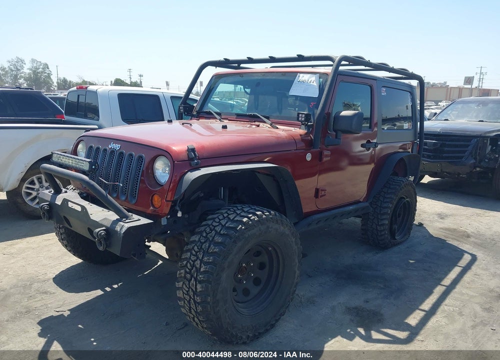 2010 JEEP WRANGLER SAHARA VIN: 1J4GA5D16AL118463