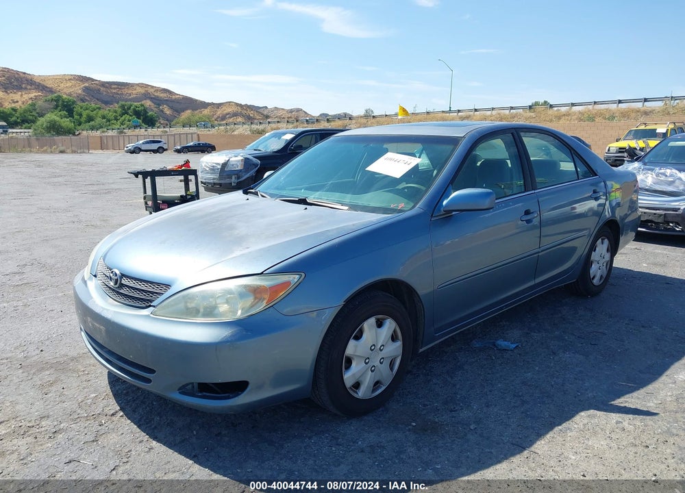 2003 TOYOTA CAMRY LE VIN: JTDBE32K430230171