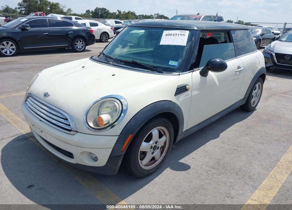 2009 MINI COOPER VIN: WMWMF33589TT68833