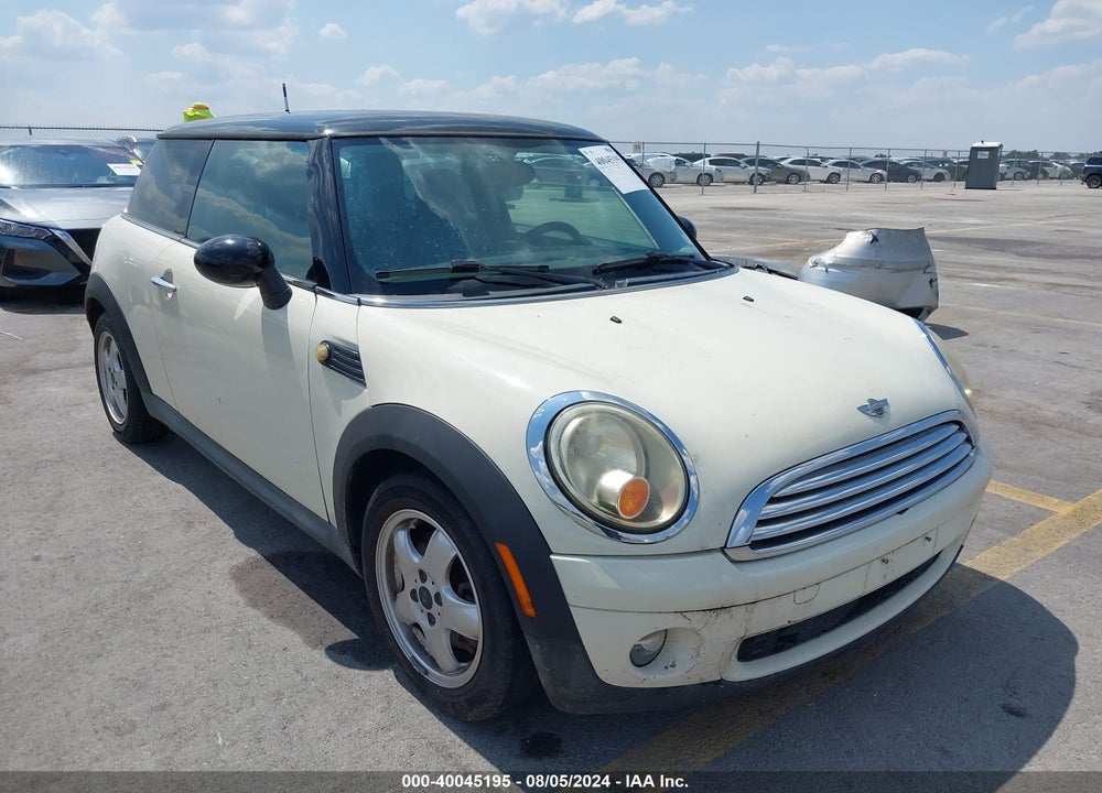 2009 MINI COOPER VIN: WMWMF33589TT68833