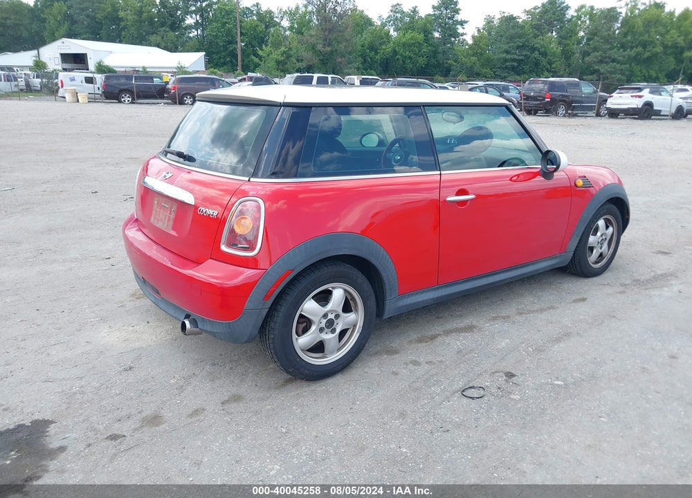 2007 MINI COOPER VIN: WMWMF33597TT50130