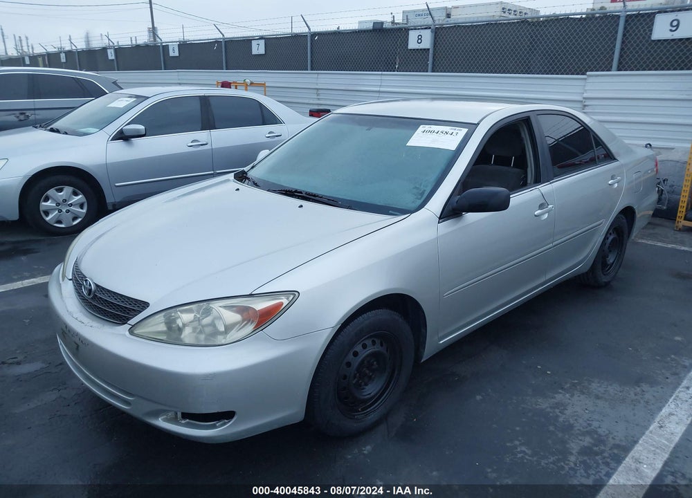 2003 TOYOTA CAMRY LE VIN: JTDBE32K930233020