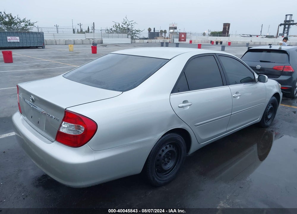 2003 TOYOTA CAMRY LE VIN: JTDBE32K930233020