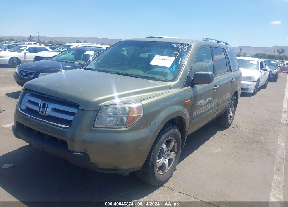 2007 HONDA PILOT EX-L VIN: 5FNYF28577B027236