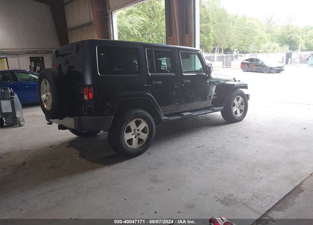 2009 JEEP WRANGLER UNLIMITED SAHARA VIN: 1J4GA59169L781746