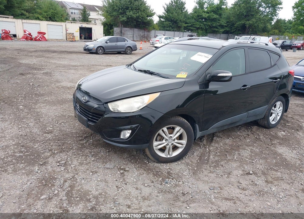 2013 HYUNDAI TUCSON GLS VIN: KM8JUCAC1DU609207