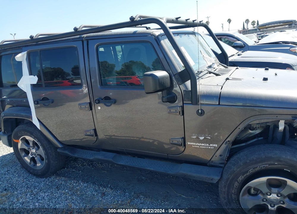 2016 JEEP WRANGLER UNLIMITED SAHARA VIN: 1C4HJWEG5GL248522