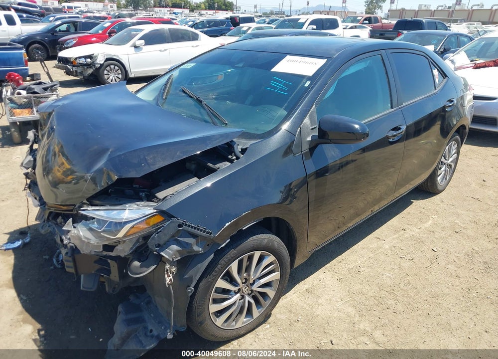 2018 TOYOTA COROLLA XLE VIN: 5YFBURHEXJP738428