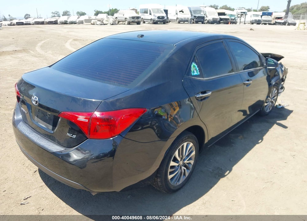 2018 TOYOTA COROLLA XLE VIN: 5YFBURHEXJP738428