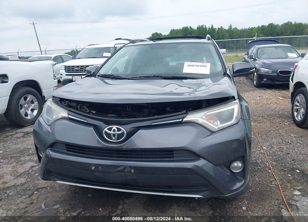 2016 TOYOTA RAV4 XLE VIN: JTMRFREV8GJ091084