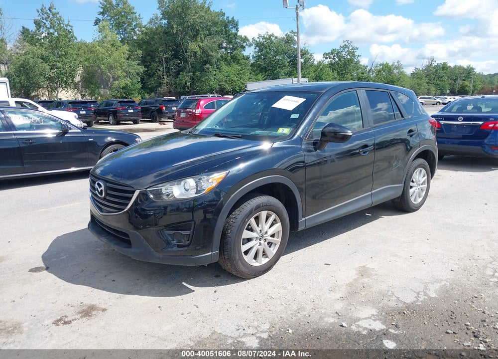 2016 MAZDA CX-5 TOURING VIN: JM3KE2CY0G0609047