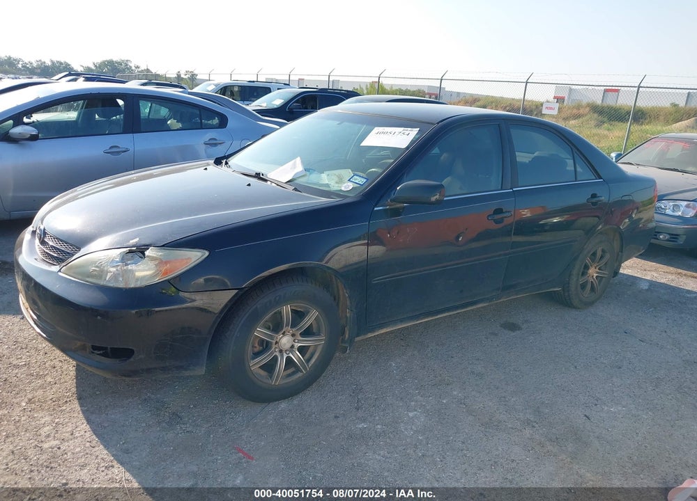 2003 TOYOTA CAMRY LE VIN: JTDBE32KX30242891