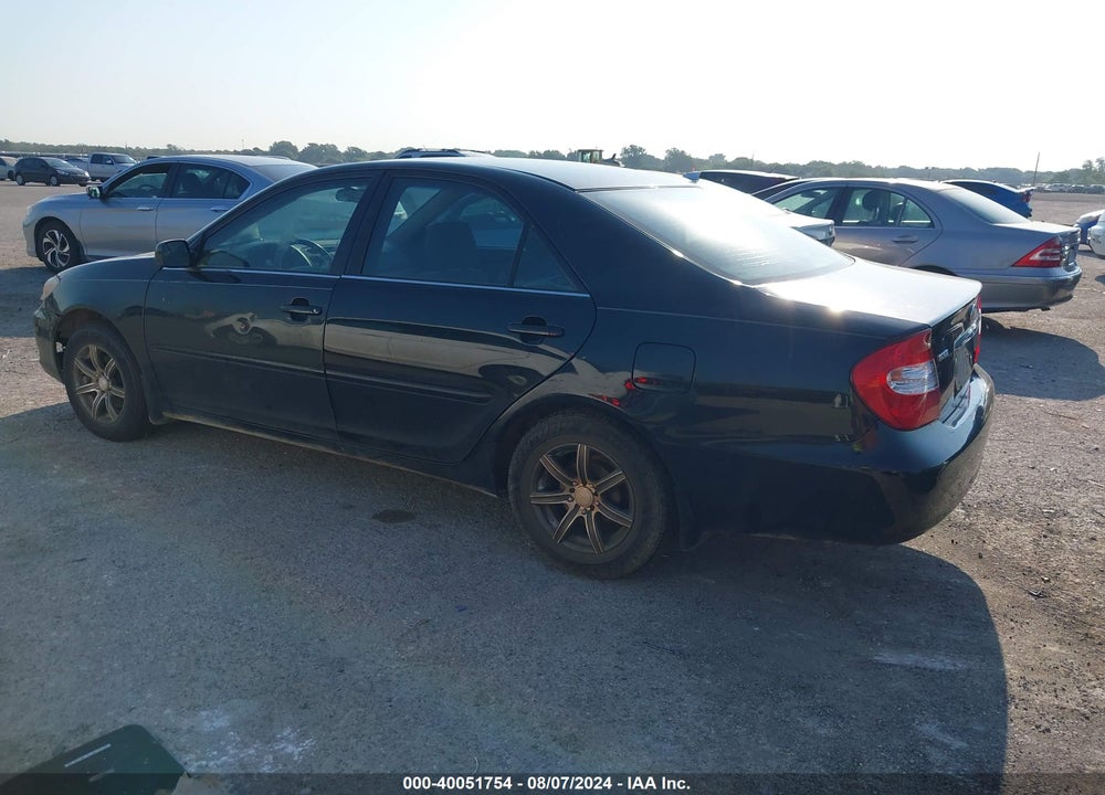 2003 TOYOTA CAMRY LE VIN: JTDBE32KX30242891