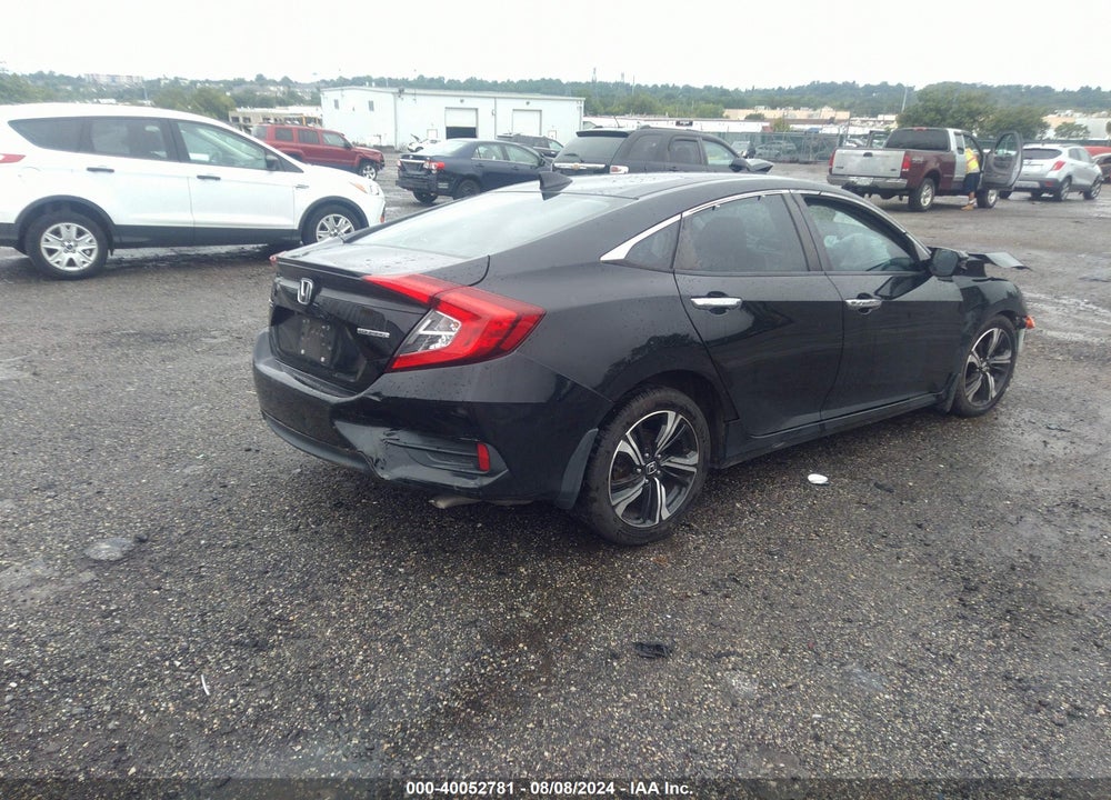 2016 HONDA CIVIC TOURING VIN: 2HGFC1F94GH633489