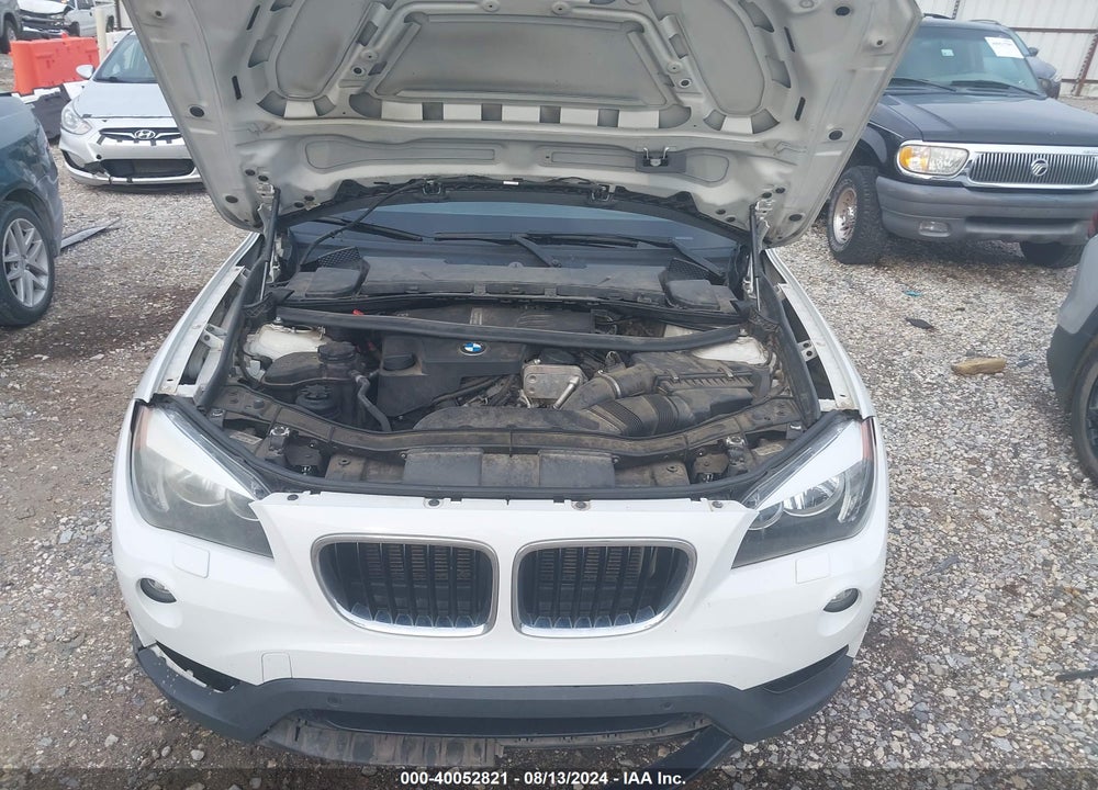 2014 BMW X1 VIN: WBAVL1C57EVY17595