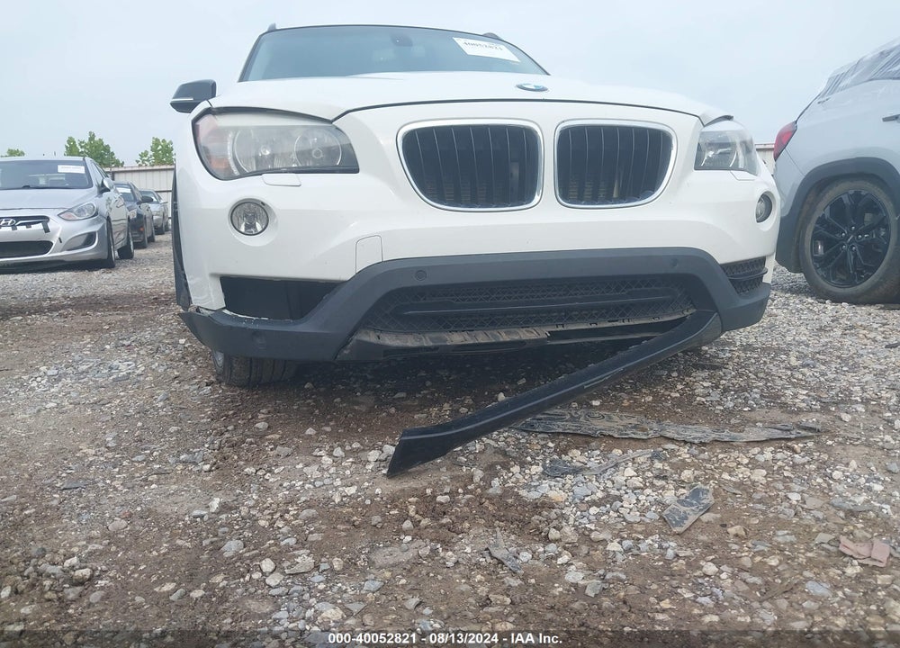 2014 BMW X1 VIN: WBAVL1C57EVY17595
