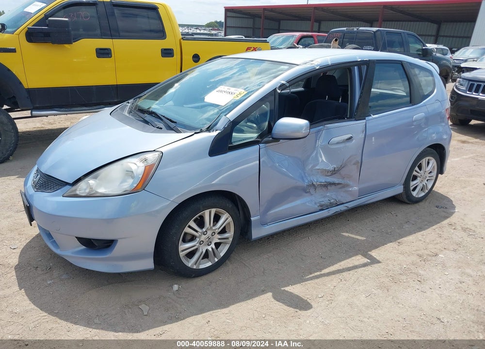 2009 HONDA FIT SPORT VIN: JHMGE88659S039657