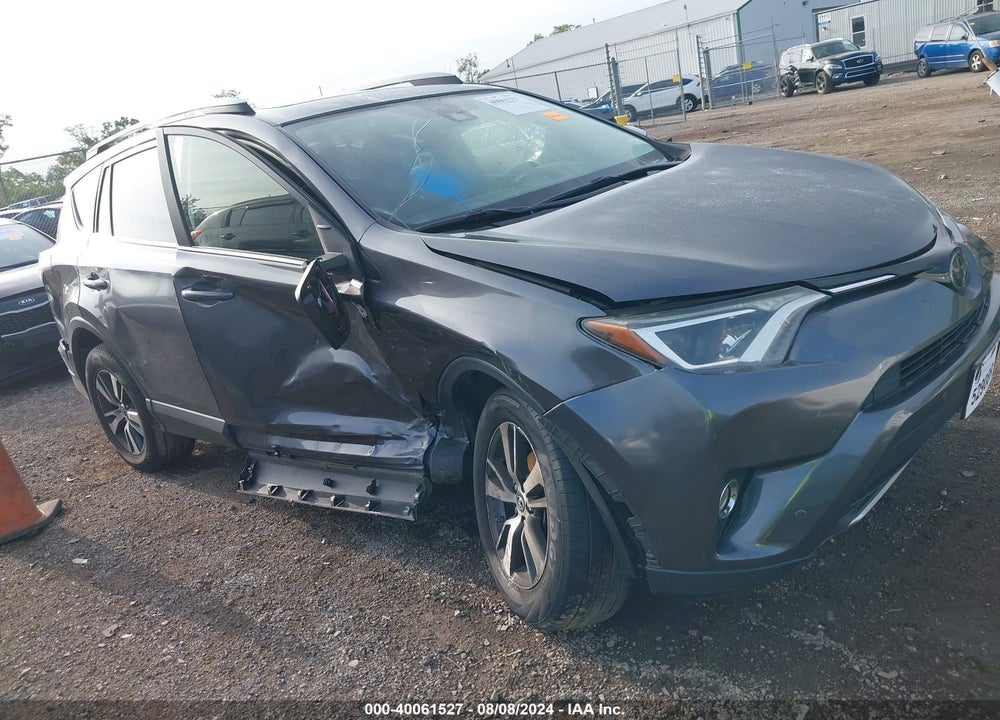 2018 TOYOTA RAV4 XLE VIN: JTMRFREV7JD252238