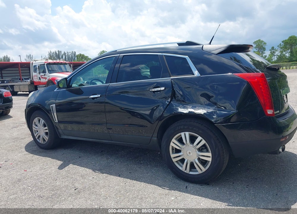 2014 CADILLAC SRX LUXURY COLLECTION VIN: 3GYFNBE38ES519026