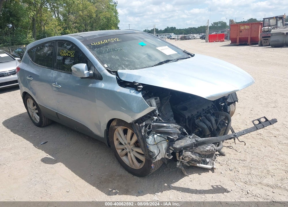 2013 HYUNDAI TUCSON LIMITED VIN: KM8JU3AC5DU661438