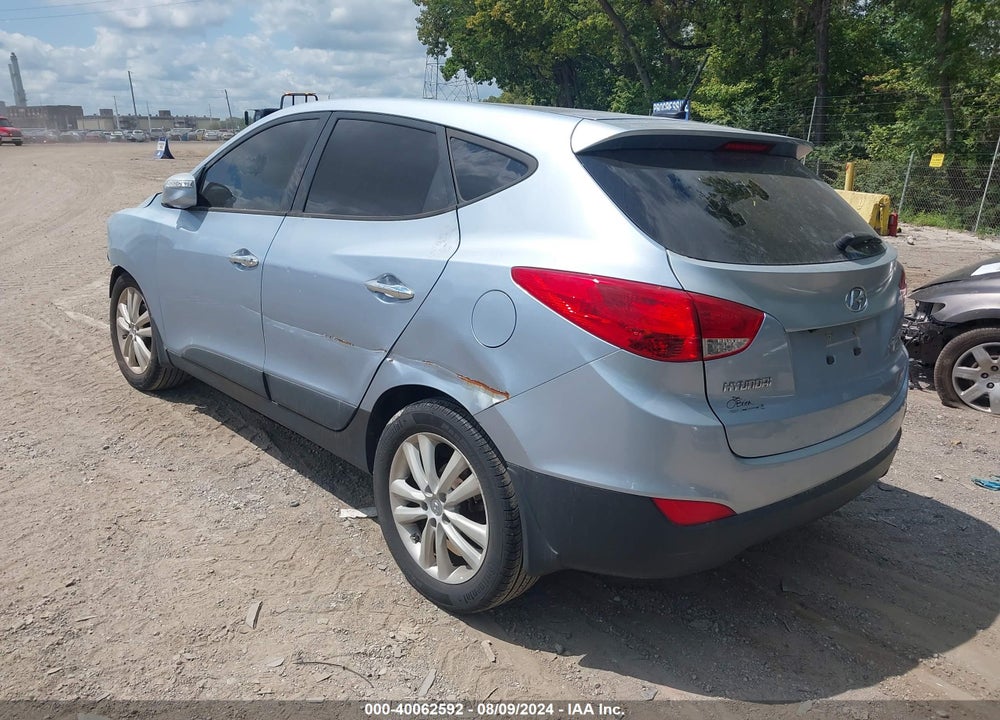2013 HYUNDAI TUCSON LIMITED VIN: KM8JU3AC5DU661438
