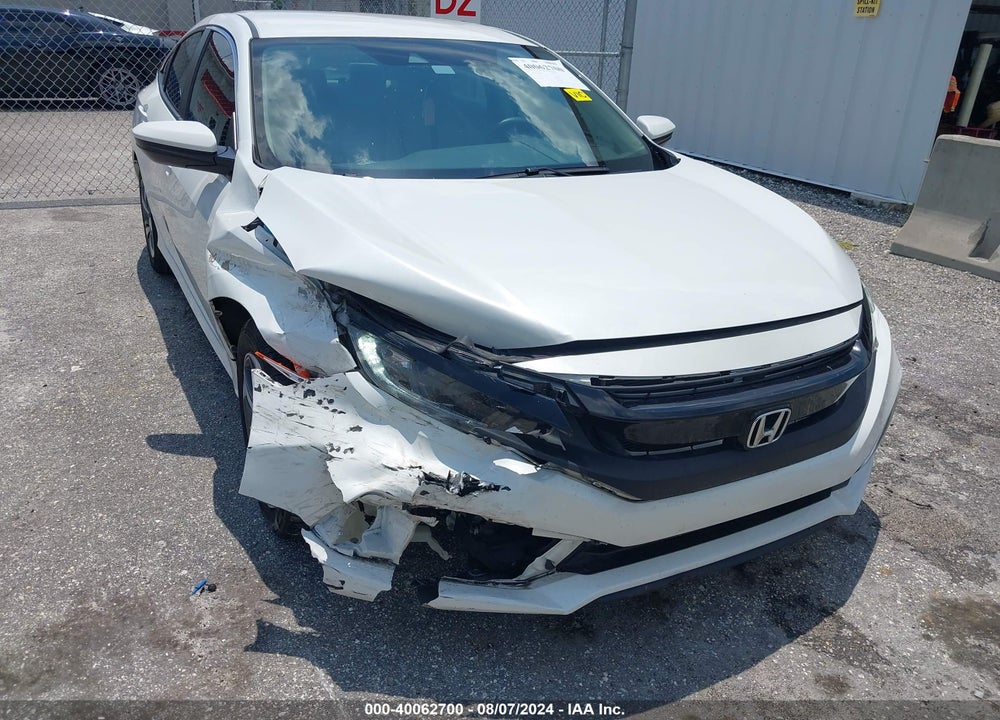 2019 HONDA CIVIC LX VIN: 19XFC2F6XKE020808