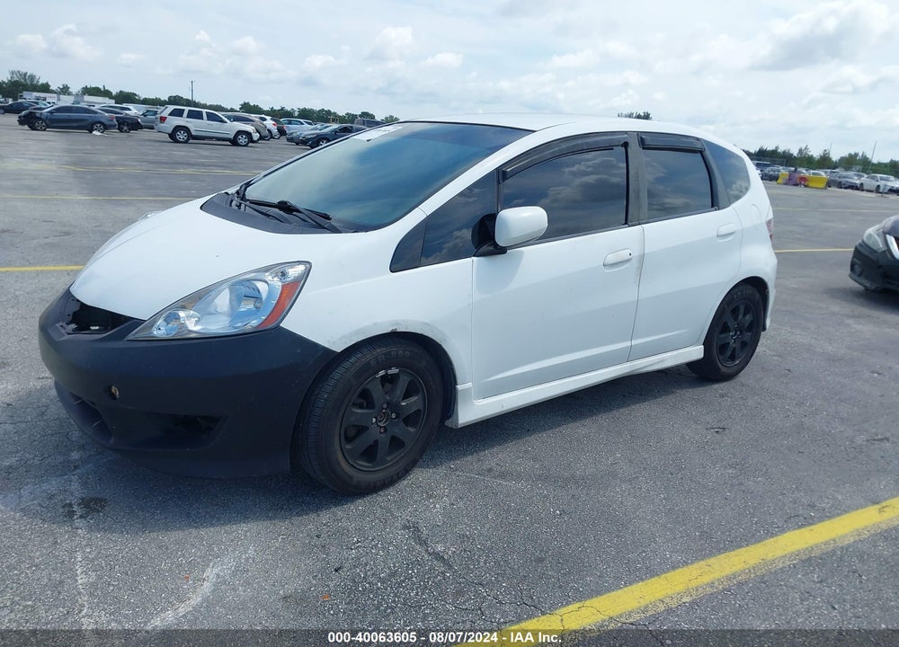 2009 HONDA FIT SPORT VIN: JHMGE88439S054110