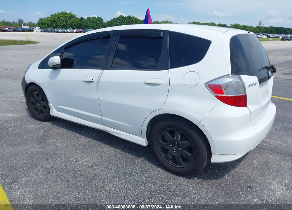 2009 HONDA FIT SPORT VIN: JHMGE88439S054110