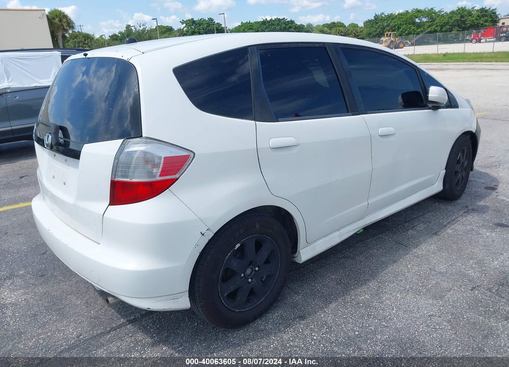 2009 HONDA FIT SPORT VIN: JHMGE88439S054110