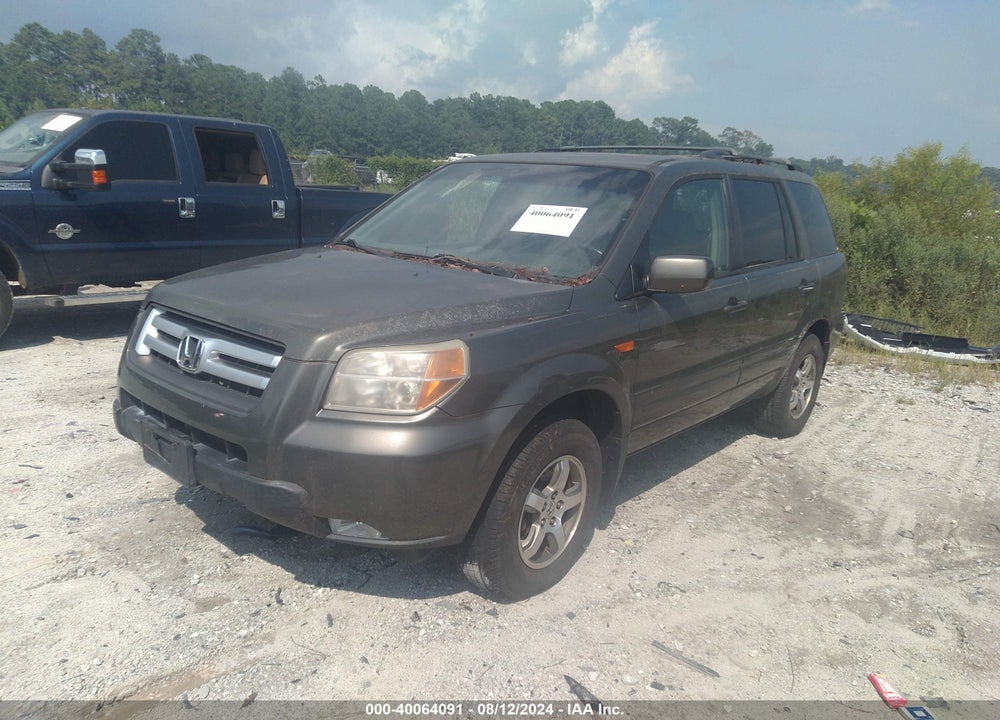 2006 HONDA PILOT EX-L VIN: 5FNYF285X6B026712