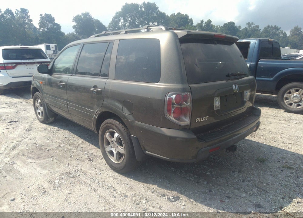 2006 HONDA PILOT EX-L VIN: 5FNYF285X6B026712