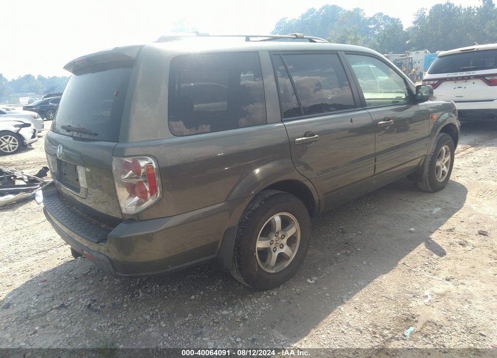 2006 HONDA PILOT EX-L VIN: 5FNYF285X6B026712
