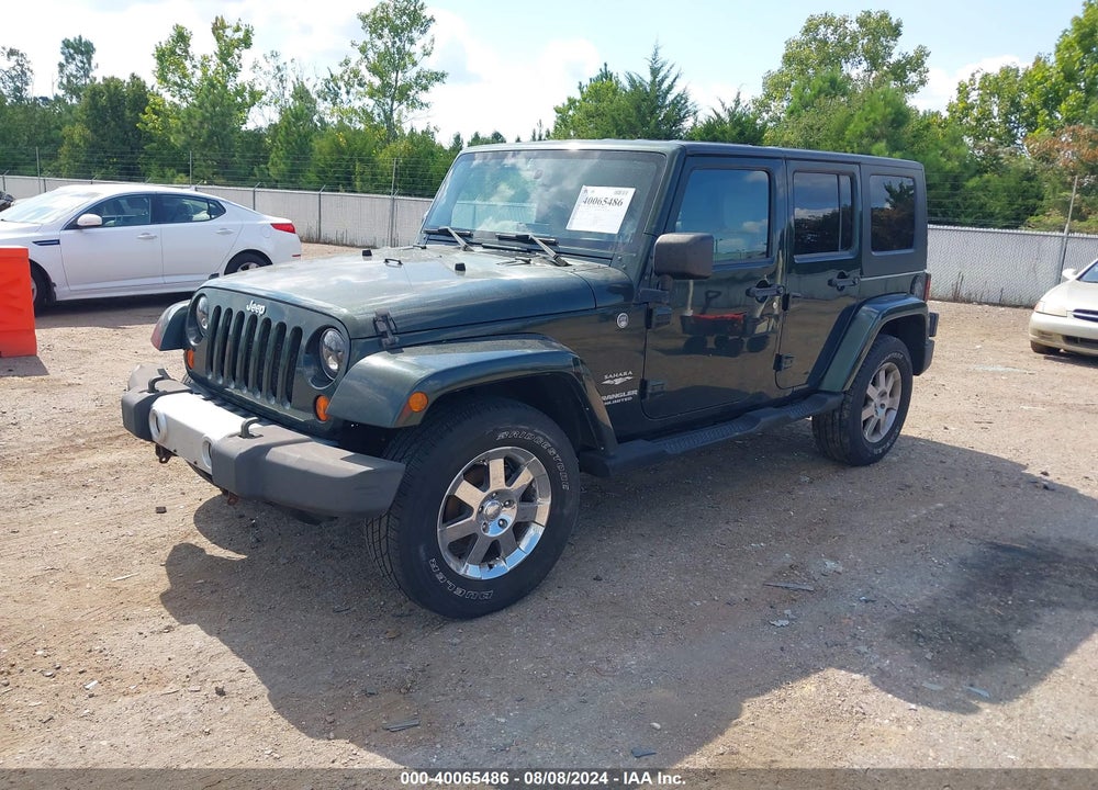 2010 JEEP WRANGLER UNLIMITED SAHARA VIN: 1J4BA5H11AL122585