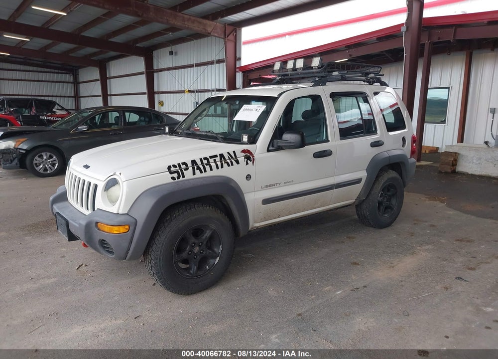 2003 JEEP LIBERTY SPORT VIN: 1J4GL48K03W643317