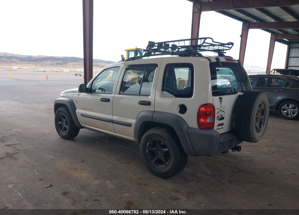 2003 JEEP LIBERTY SPORT VIN: 1J4GL48K03W643317