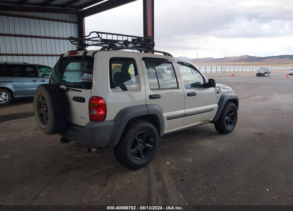 2003 JEEP LIBERTY SPORT VIN: 1J4GL48K03W643317