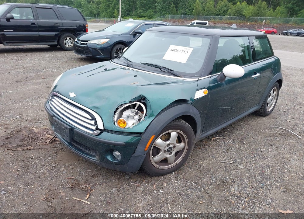 2009 MINI COOPER VIN: WMWMF33519TU73553