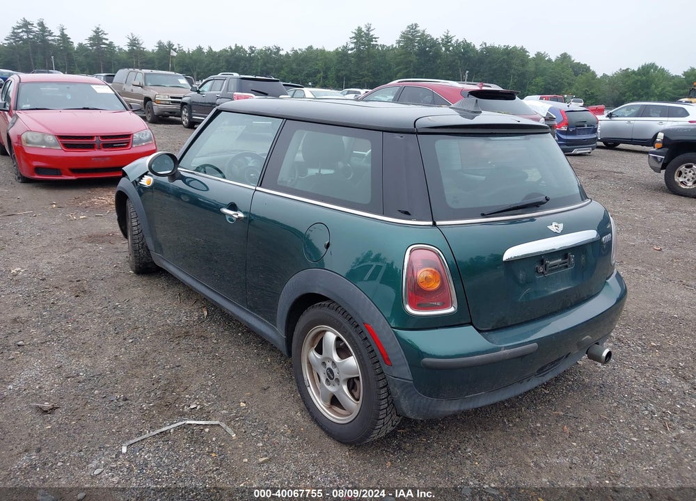 2009 MINI COOPER VIN: WMWMF33519TU73553