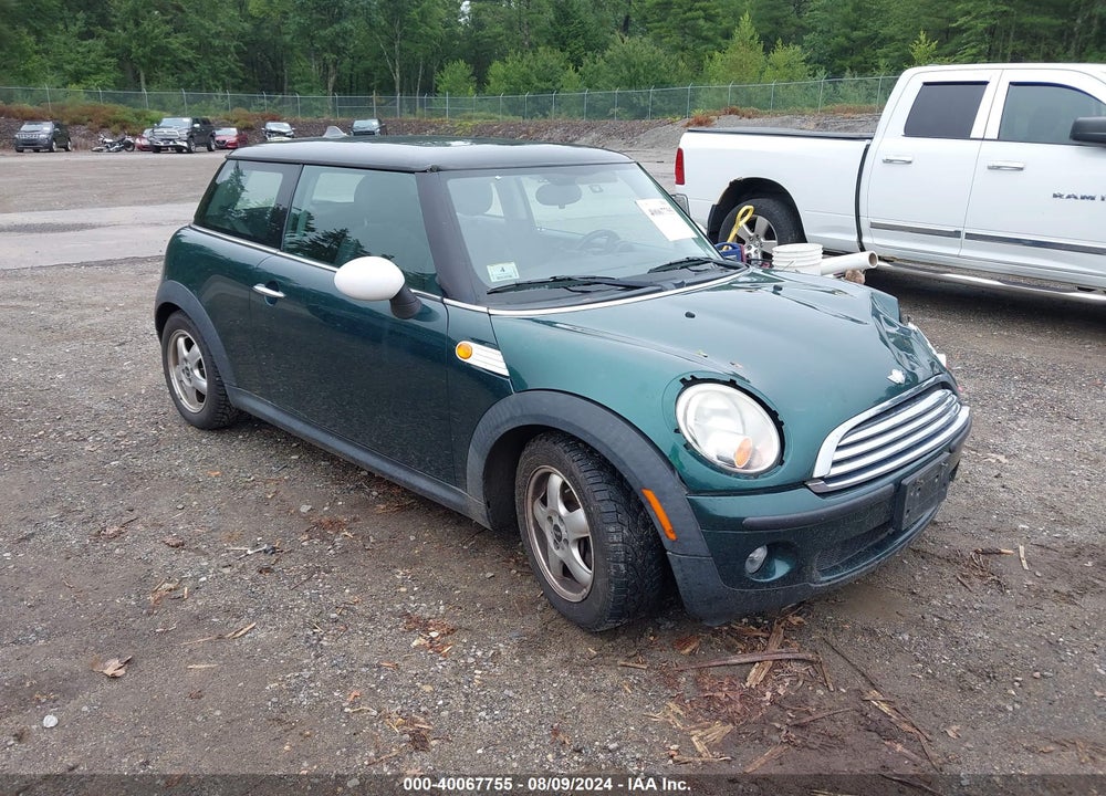 2009 MINI COOPER VIN: WMWMF33519TU73553