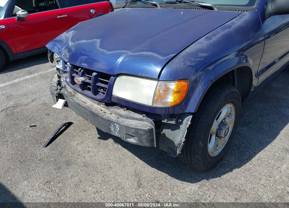 1999 KIA SPORTAGE VIN: KNDJB7236X5582651